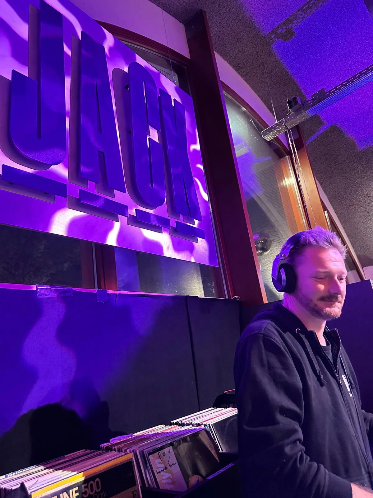 Jack Orange mixing under purple light